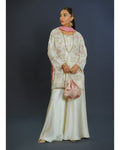 Gulnaar organza outfit with handmade embellishments and chunri dupatta.