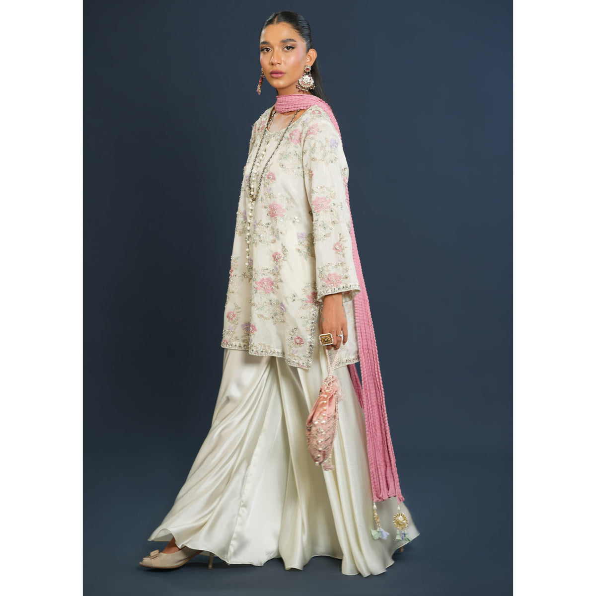 Gulnaar festive suit with embellished organza shirt.