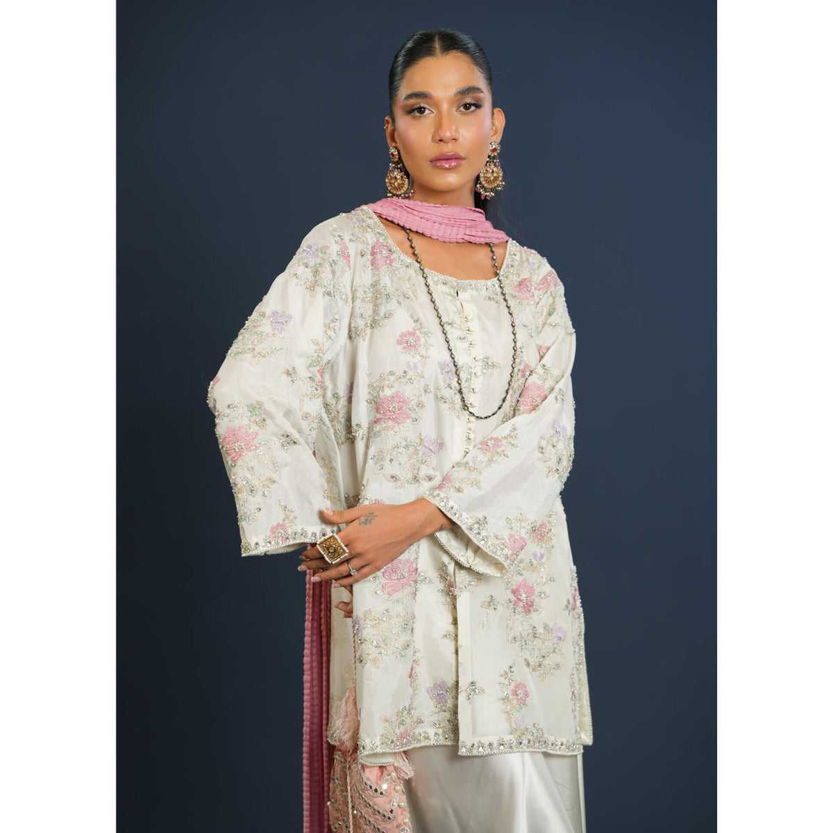 Gulnaar printed organza suit with delicate handwork.