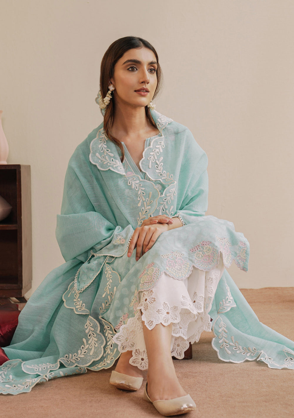 Zaal elegant lawn suit with scalloped organza dupatta.