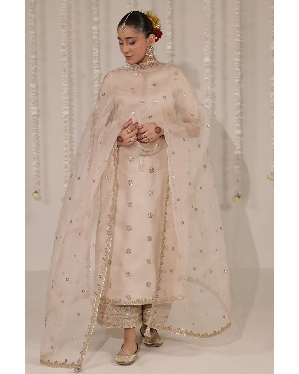 Zarnoor champagne 3-piece outfit with intricate mirror embroidery.